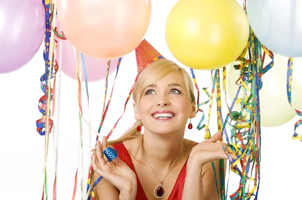Rode gekleed meisje in partij met ballonnen — Stockfoto