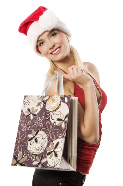 Blond Schattig Vrouw Met Een Kerst Hoed Een Boodschappentas Zoek — Stockfoto