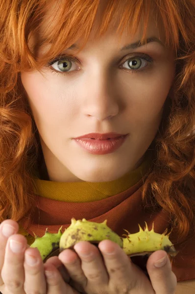 Close Young Red Haired Woman Some Wild Chestnut Hands — Stock Photo, Image
