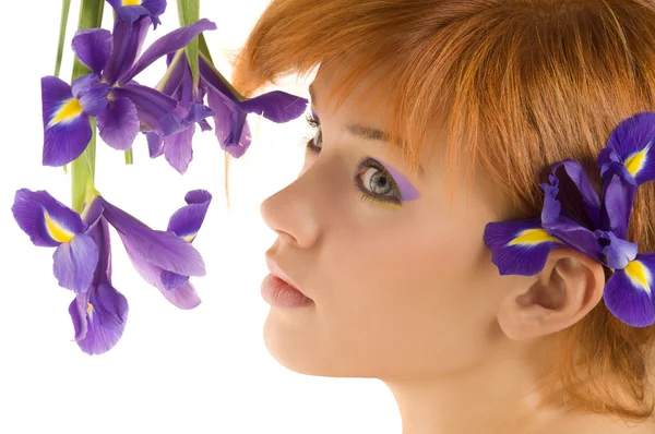 Girl with purple flower — Stock Photo, Image