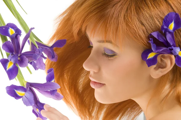 Girl with purple flower — Stock Photo, Image