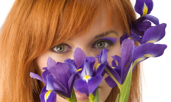 Olhos atrás da flor — Fotografia de Stock