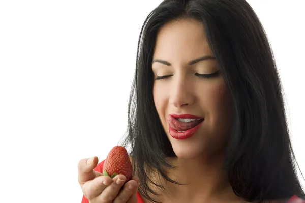 Tongue and strawberry — Stock Photo, Image