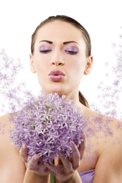 Blowing on flowers — Stock Photo, Image