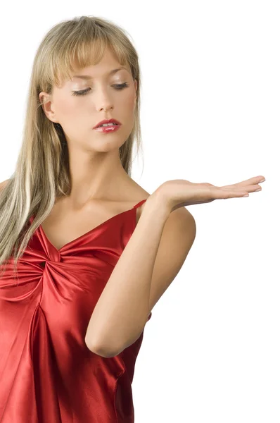 Ελκυστικό Και Ξανθά Γυναίκας Κόκκινο Φόρεμα Παρουσιάζοντας Ένα Προϊόν Λευκό — Φωτογραφία Αρχείου