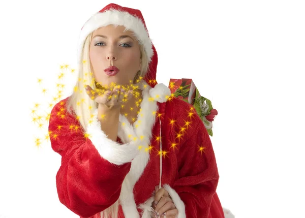 Close Van Een Blond Kerstman Blazen Stardust Van Haar Hand — Stockfoto