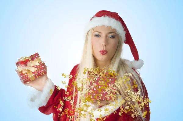 Blonder Weihnachtsmann Weht Auf Rotem Geschenkkarton — Stockfoto