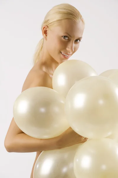 Mädchen bewaffnet Luftballons — Stockfoto