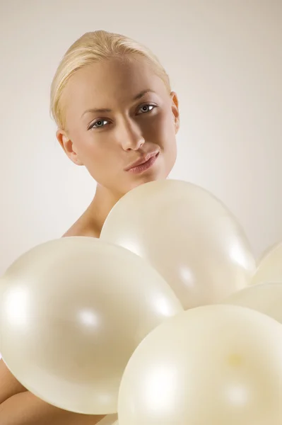 Cute Young Woman Some White Balloon Looking Camera Making Face — Stok fotoğraf