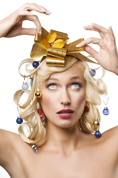 Blonde vrouw met een gouden boog — Stockfoto