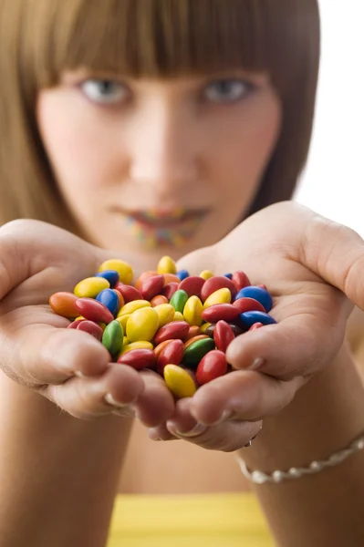 Giving smarties Royalty Free Stock Photos