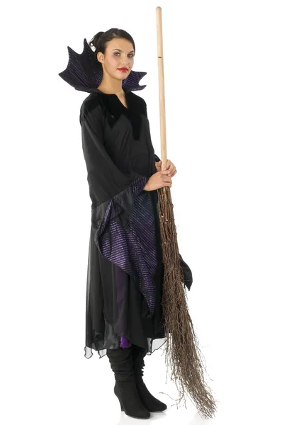 Die Hexe mit dem Besen Stockfoto