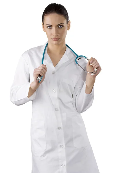 微笑女医疗医生用听诊器孤立在白色背景 免版税图库照片