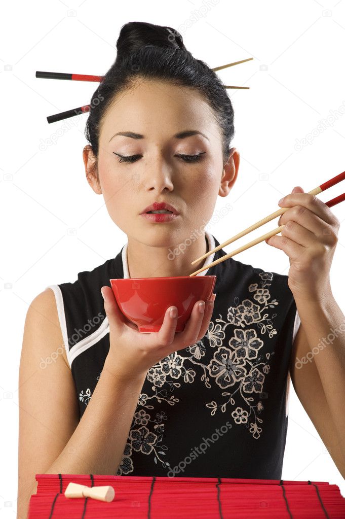 Girl eating oriental food