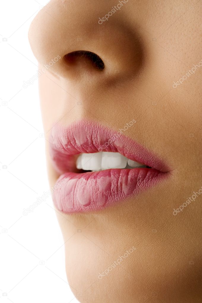 close up of woman wet lips with pink lipstick