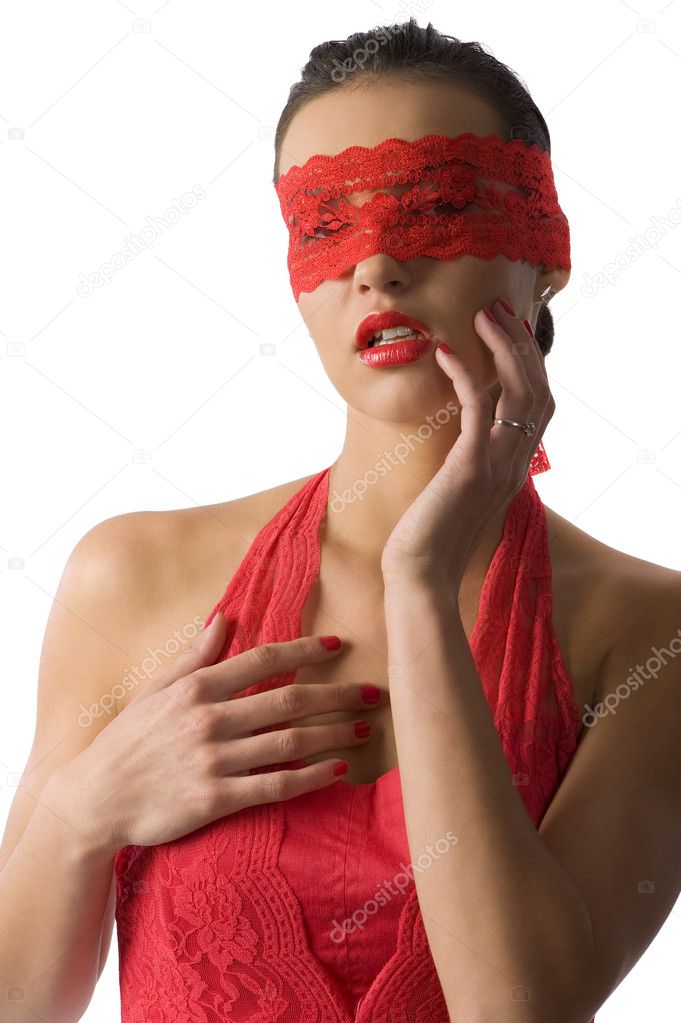 sexy portrait of a young beautiful girl with in red with lace mask and red lips