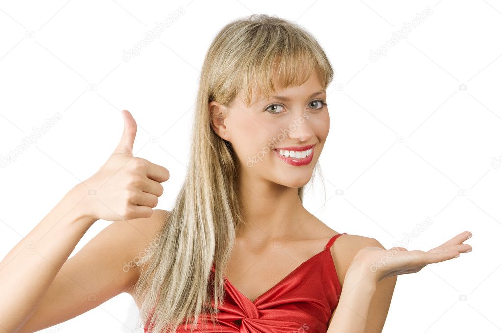 smiling and pretty girl presenting a product on white and doing sign like its good with hand