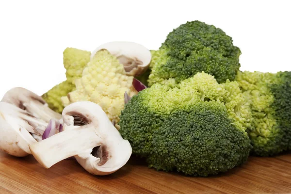 stock image Cauliflower, mushrooms on wooden surface