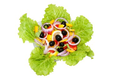 Salad of sweet peppers, lettuka, olives and onions on a platter