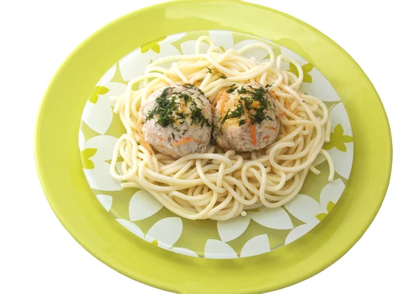 Фрикадельки со спагетти на зеленой тарелке — стоковое фото