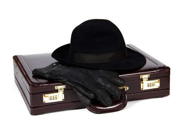 stock image Suitcase with laying from above a hat and gloves