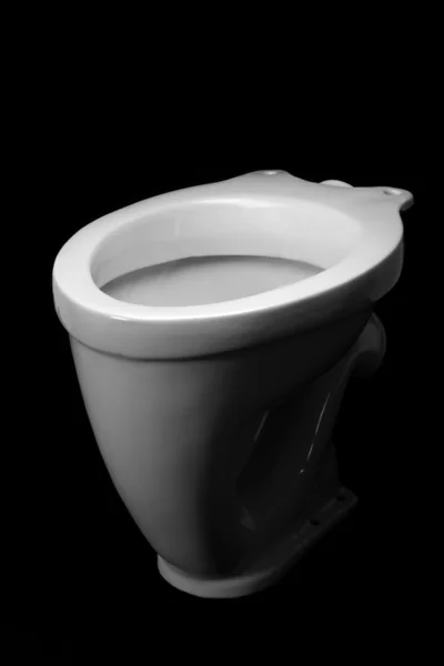 O vaso sanitário, isolado em fundo preto — Fotografia de Stock