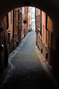 Narrow streets of Stockholm old town clipart