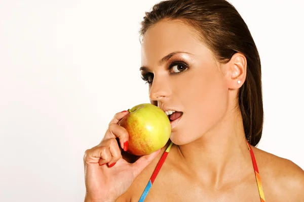 Beautiful woman holding a apple — Stock Photo, Image