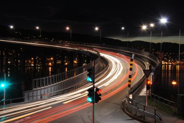 Traffic light at night in Tromso clipart