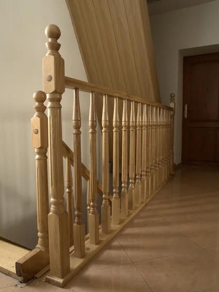 Stock image The wooden balustrade in room