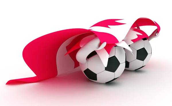Iki futbol topları Kanada bayrağı basılı tutun. — Stok fotoğraf