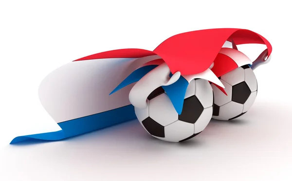 Два футбольных мяча держат флаг Нидерландов — стоковое фото
