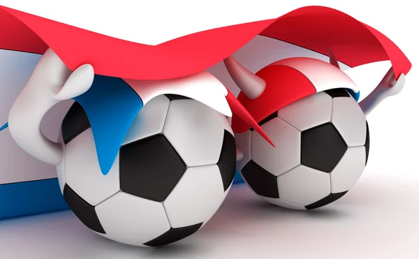 Два футбольных мяча держат флаг Нидерландов — стоковое фото