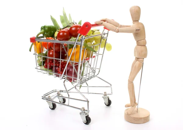 Frutas e legumes em um carrinho de compras — Fotografia de Stock