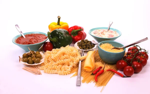 stock image Italian pasta and the ingredients to make a meal