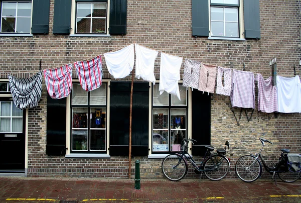 stock image Laundry, drying on a clothesline in an old Dutch village