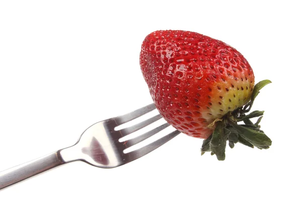 Strawberry on a fork — Stock Photo, Image