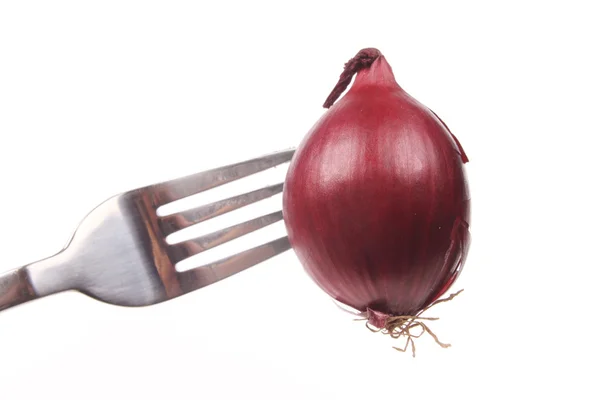 Onion on a fork — Stock Photo, Image