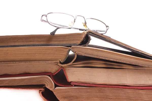 Szemüveg, a régi tanulmány-könyvek — Stock Fotó