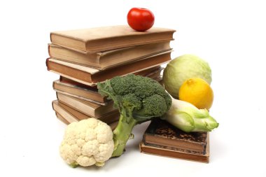 Old cookbooks with several vegetables clipart