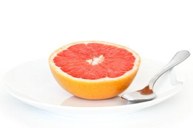 Grapefruit on plate clipart