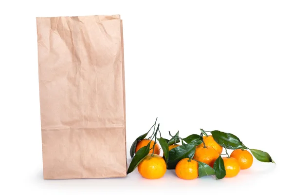 Stock image Tangerines with shopping bag