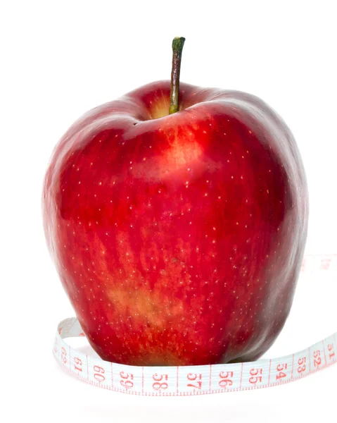 Jabłko z centymetr — Zdjęcie stockowe