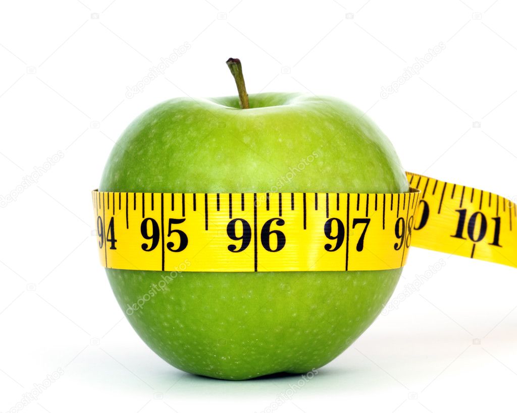 Green apple with centimeter