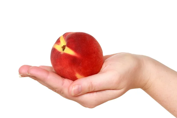 Peach with hand — Stock Photo, Image