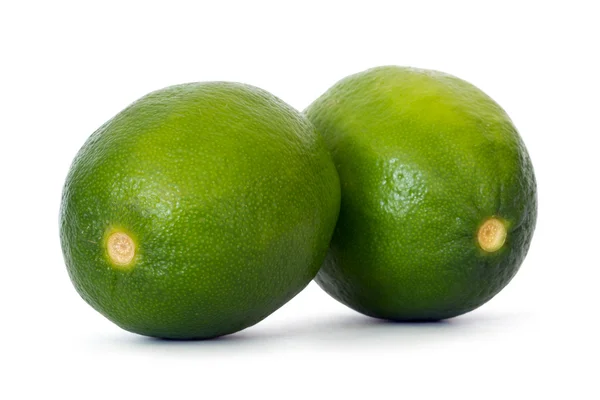 Två limefrukterna — Stockfoto