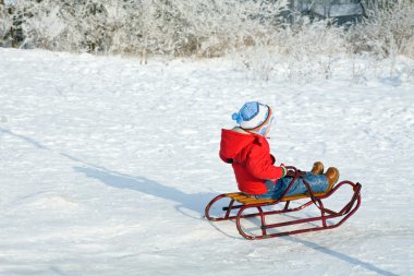 Boy with sled clipart