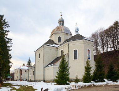 Spring view of old Pidhirtsi St. Onufriya Church clipart