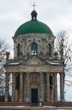 Spring Pidhirtsi Roman Catholic church view (Ukraine) clipart