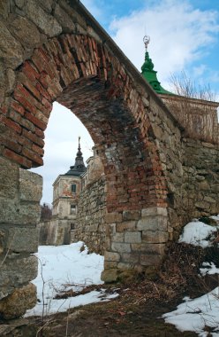 Spring view of old Pidhirtsi Castle (Ukraine, Lvivska Region, built in 1635-1640 by order of Polish Hetman Stanislaw Koniecpolski) clipart